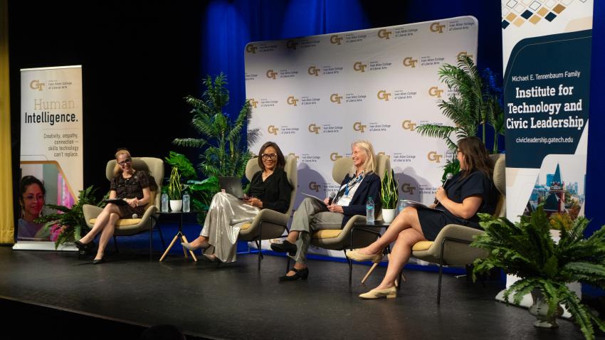 Dean Amanda Murdie and panelists Wendy H. Wong, Marilyn A. Brown, and Gwynn Monagle seated onstage during the AI & Society Series event on Oct. 8, 2026. 